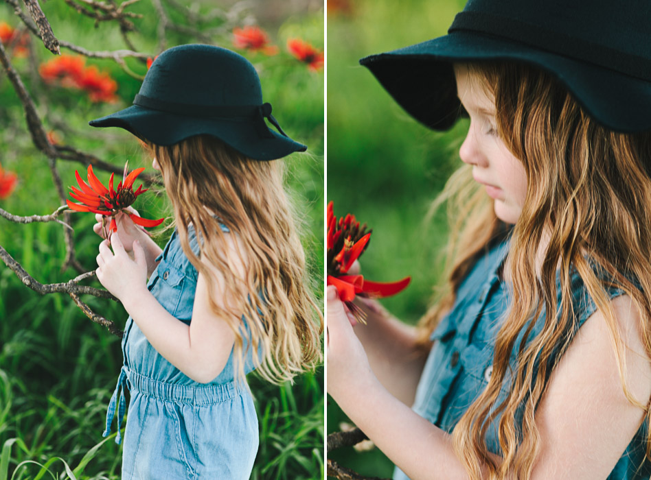 girl under flame tree, black felt hat, kmart jumpsuit, Brachychiton acerifolius