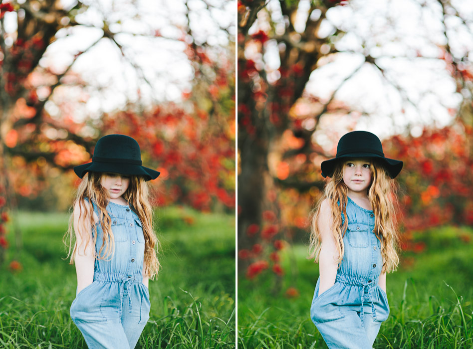 girls wearing black felt bowler hat, standing under flame tree, Brachychiton acerifolius