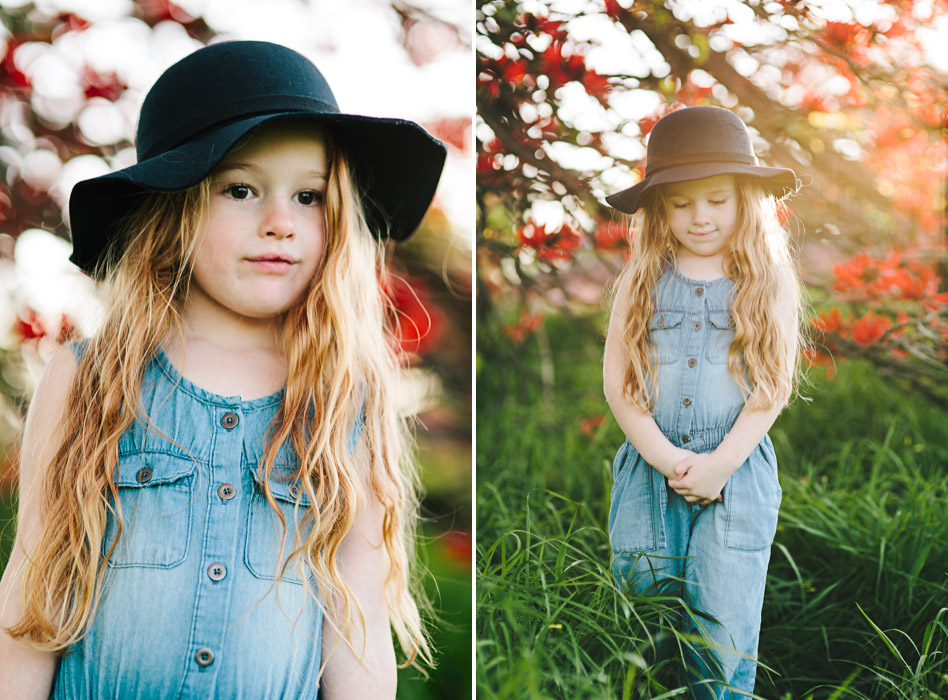 Brachychiton acerifolius, girls wearing black felt bowler hat, standing under flame tree