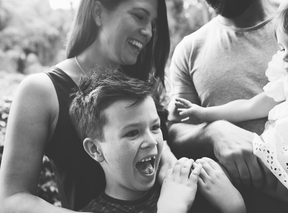 photograph or family laughing