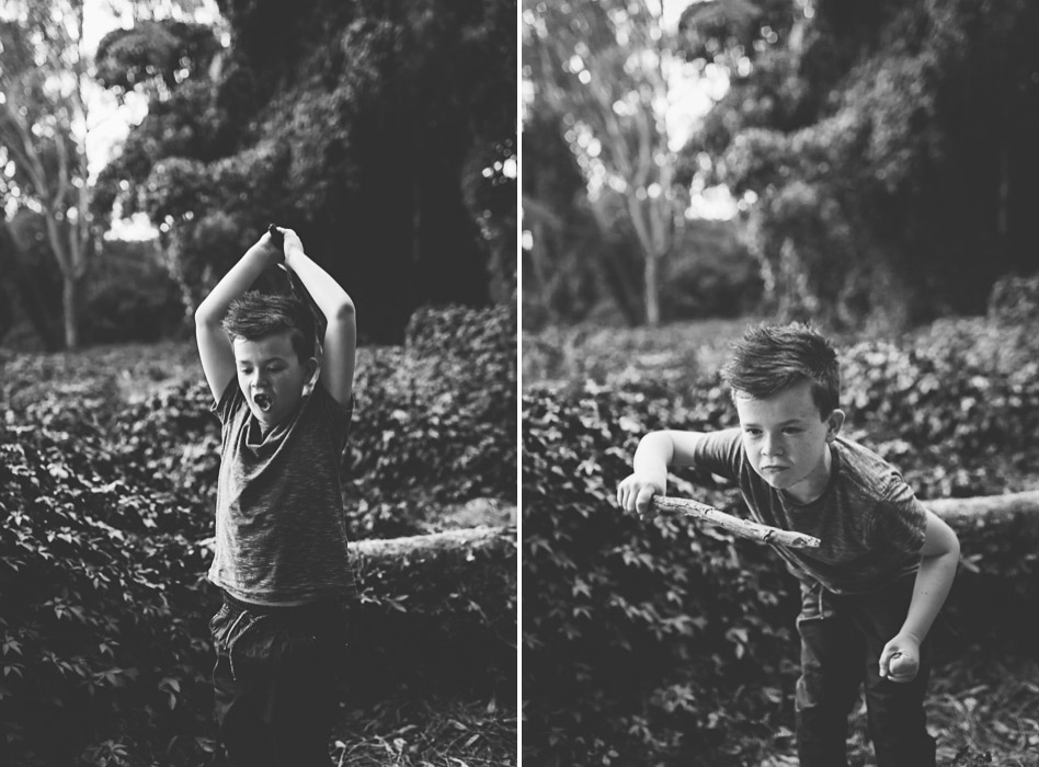 boy playing with a stick