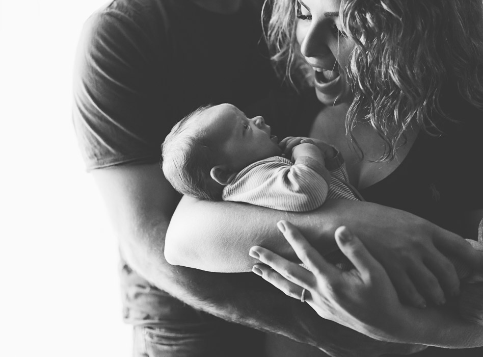 parents with newborn baby