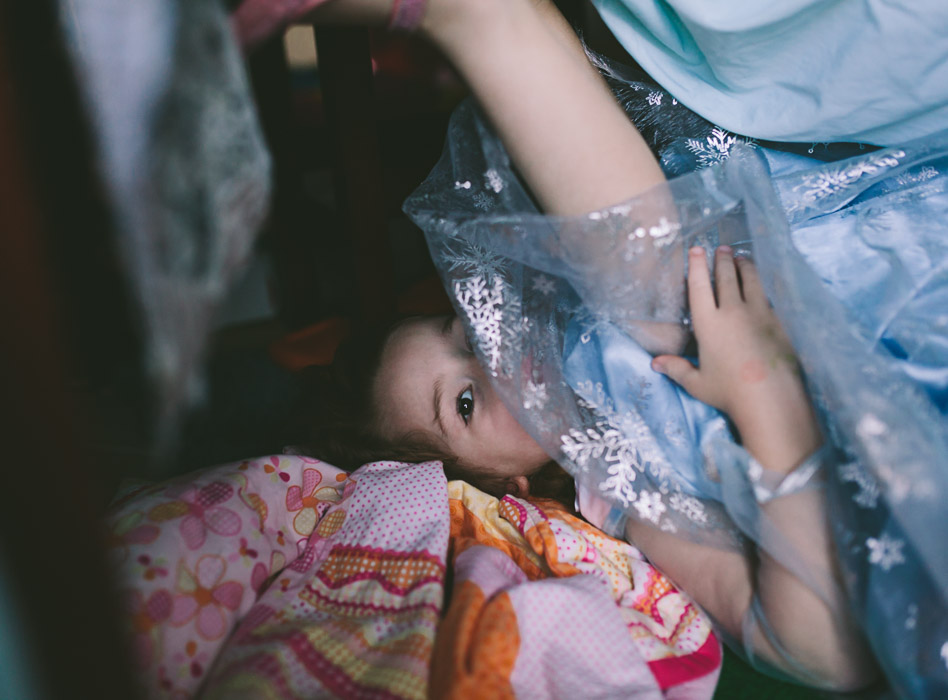 girl plays in pillow forte