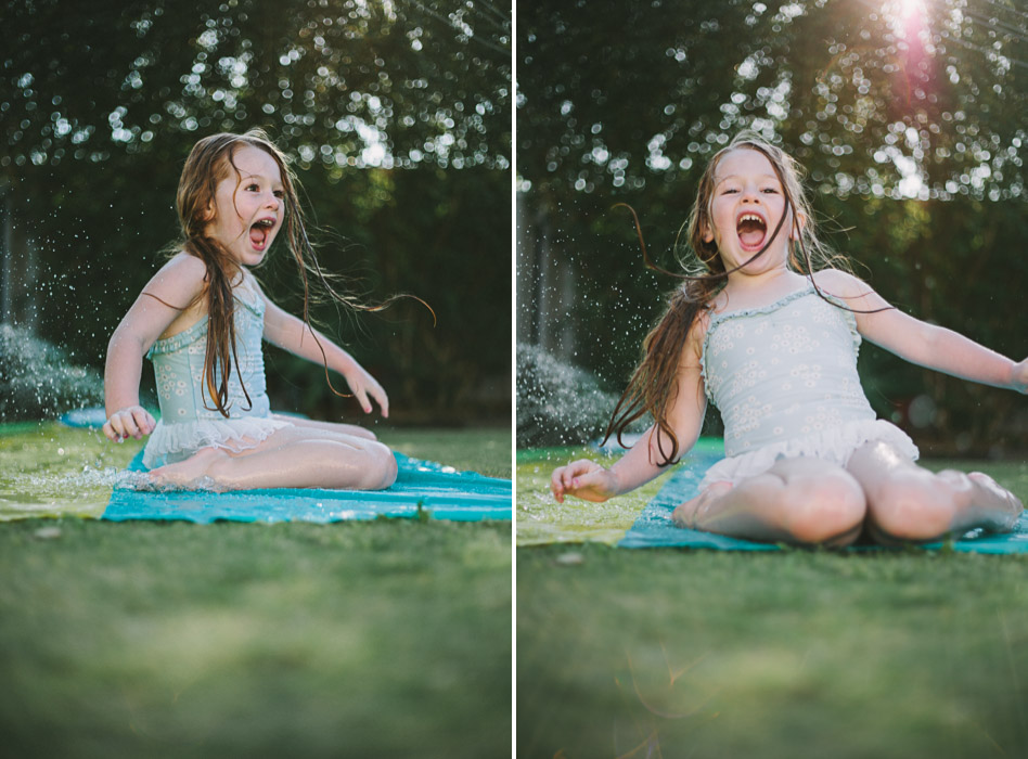 girl laughing on slip n slide