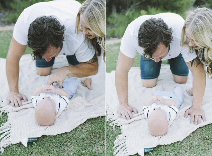 parents playing with baby