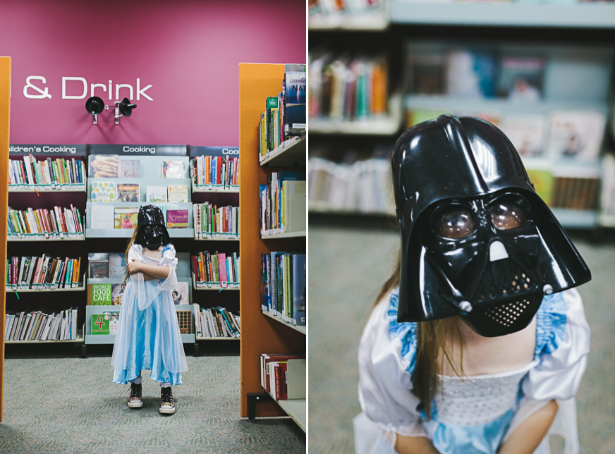 girl dressed as darth vader at the library