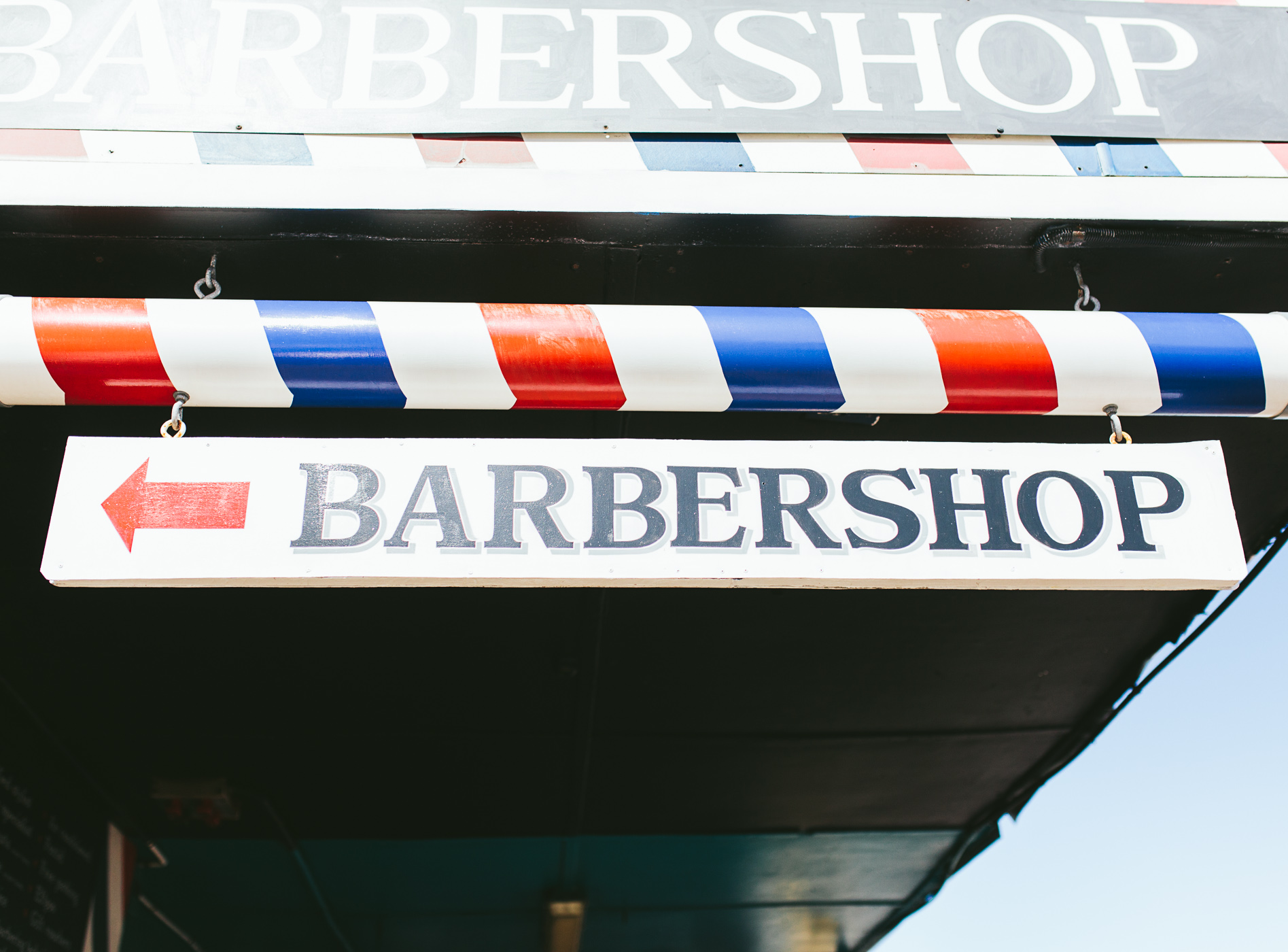 kennedeys barber shop sign