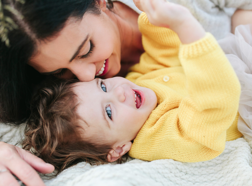 mother and toddler cuddle