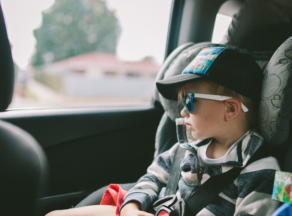 Boy riding in car to Jurien Bay