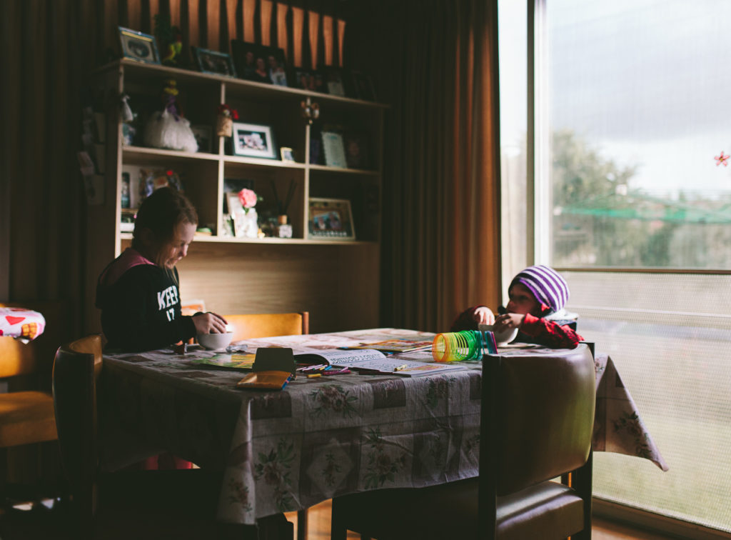 grandchildren play at donnas table