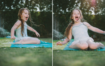 girl laughing on slip n slide