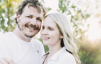 parents posing for photo